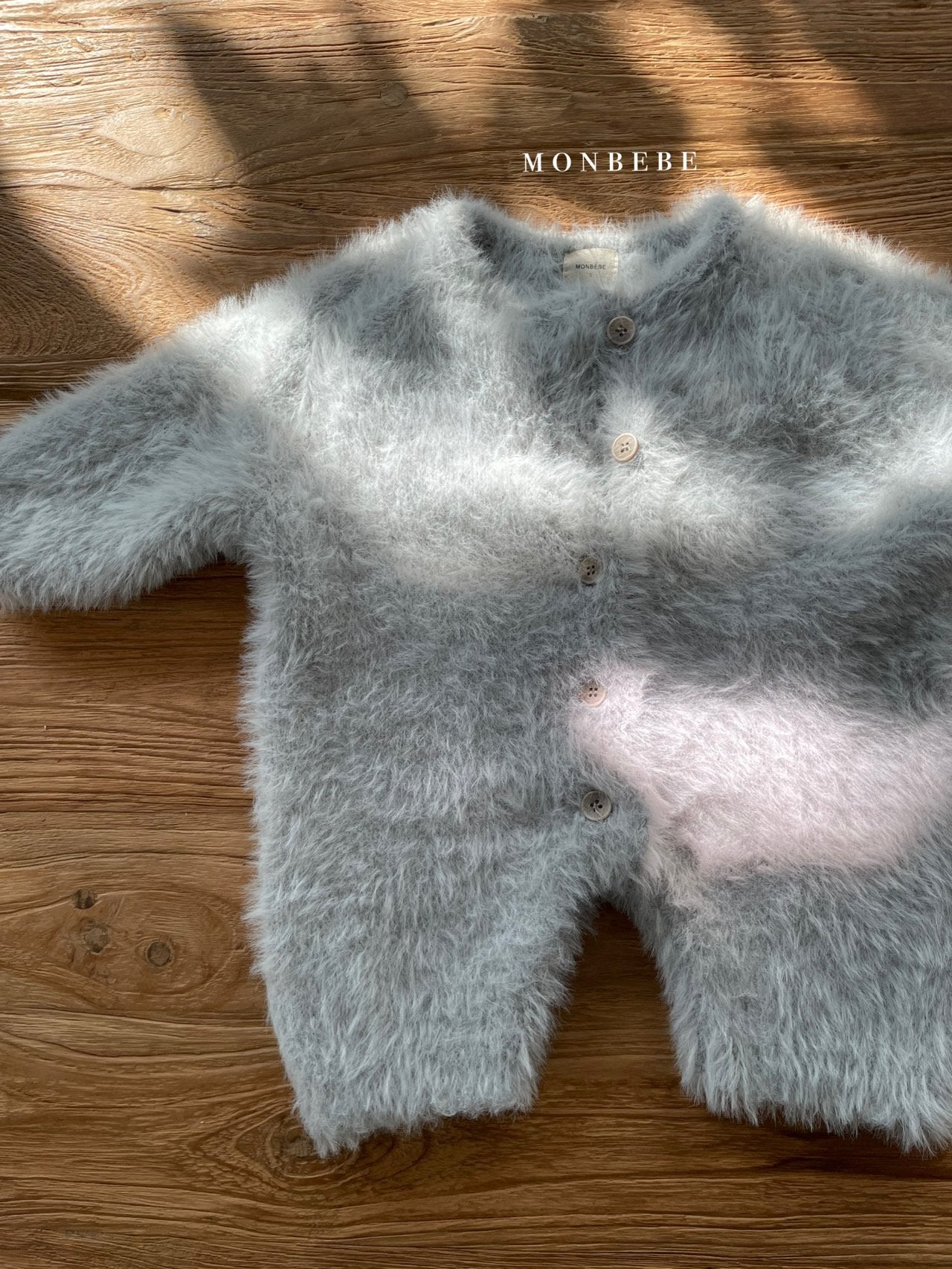 Explore the Fluffy Monza Monbebe Babysuit